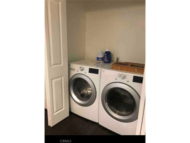 Charming Mediterranean style townhome located in Tustin Ranch on Tustin Ranch Golf Club in California - for sale on GolfHomes.com, golf home, golf lot