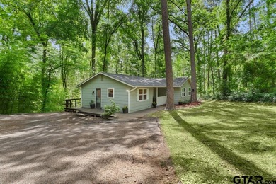 ***Priced to Sell*** Charming Updated Cottage with Serene Sounds on Hide-A-Way Lake Golf Course in Texas - for sale on GolfHomes.com, golf home, golf lot