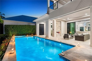 Contemporary coastal architecture with clean, modern lines is on The Moorings Country Club in Florida - for sale on GolfHomes.com, golf home, golf lot