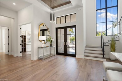 Contemporary coastal architecture with clean, modern lines is on The Moorings Country Club in Florida - for sale on GolfHomes.com, golf home, golf lot