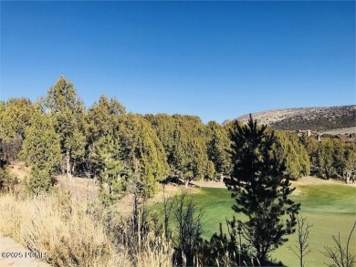 This .7 acre Juniper Hills homesite backs to the famed 18th on Red Ledges Golf Club in Utah - for sale on GolfHomes.com, golf home, golf lot