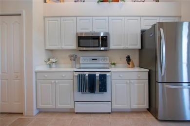 This lovely home is a sought after St. Charles model, Great Room on Heritage Oaks Golf and Country Club in Florida - for sale on GolfHomes.com, golf home, golf lot