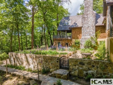 Situated on a large lot, prominently overlooking the 10th golf on Wade Hampton Golf Club in North Carolina - for sale on GolfHomes.com, golf home, golf lot