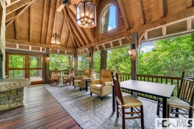Situated on a large lot, prominently overlooking the 10th golf on Wade Hampton Golf Club in North Carolina - for sale on GolfHomes.com, golf home, golf lot