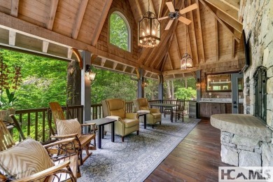 Situated on a large lot, prominently overlooking the 10th golf on Wade Hampton Golf Club in North Carolina - for sale on GolfHomes.com, golf home, golf lot
