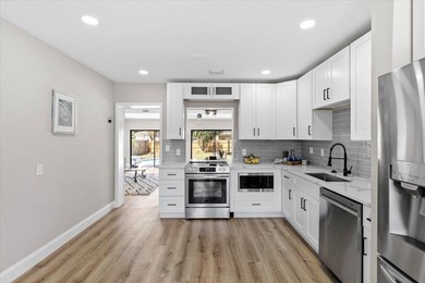 This beautifully renovated home in the heart of Lake Worth Beach on Lake Worth Municipal Golf Course in Florida - for sale on GolfHomes.com, golf home, golf lot