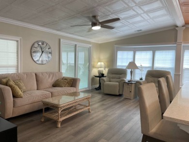 BEAUTIFULLY UPDATED 2 BEDROOM HOME IN 55+ COMMUNITY  LIKE NEW!!! on Lake Fairways Country Club in Florida - for sale on GolfHomes.com, golf home, golf lot