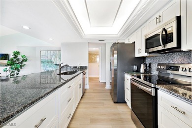 Experience this contemporary second-floor condominium featuring on The Forest Country Club in Florida - for sale on GolfHomes.com, golf home, golf lot