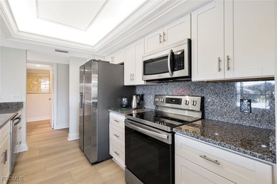 Experience this contemporary second-floor condominium featuring on The Forest Country Club in Florida - for sale on GolfHomes.com, golf home, golf lot