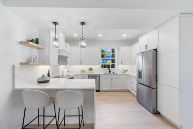 Discover a refined take on modern living in this fully renovated on Polo Club of Boca Raton in Florida - for sale on GolfHomes.com, golf home, golf lot