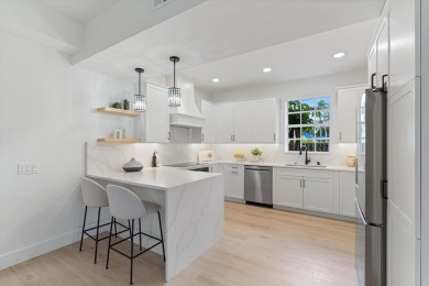 Discover a refined take on modern living in this fully renovated on Polo Club of Boca Raton in Florida - for sale on GolfHomes.com, golf home, golf lot