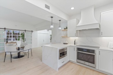 Discover a refined take on modern living in this fully renovated on Polo Club of Boca Raton in Florida - for sale on GolfHomes.com, golf home, golf lot