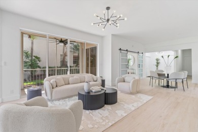Discover a refined take on modern living in this fully renovated on Polo Club of Boca Raton in Florida - for sale on GolfHomes.com, golf home, golf lot