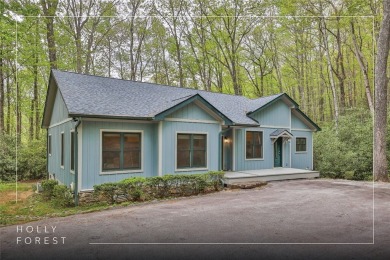 Nestled in the popular Holly Forest community of Sapphire, this on Sapphire National Golf Club in North Carolina - for sale on GolfHomes.com, golf home, golf lot