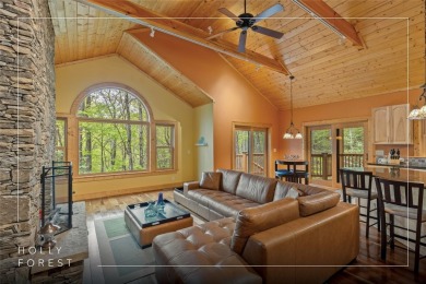 Nestled in the popular Holly Forest community of Sapphire, this on Sapphire National Golf Club in North Carolina - for sale on GolfHomes.com, golf home, golf lot