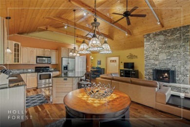 Nestled in the popular Holly Forest community of Sapphire, this on Sapphire National Golf Club in North Carolina - for sale on GolfHomes.com, golf home, golf lot