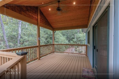 Nestled in the popular Holly Forest community of Sapphire, this on Sapphire National Golf Club in North Carolina - for sale on GolfHomes.com, golf home, golf lot