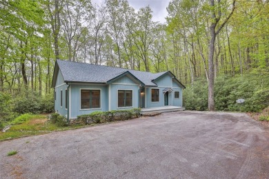 Nestled in the popular Holly Forest community of Sapphire, this on Sapphire National Golf Club in North Carolina - for sale on GolfHomes.com, golf home, golf lot