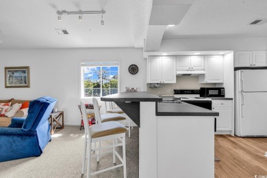 Welcome to your dream retreat! This exquisite top floor end unit on The Valley At Eastport in South Carolina - for sale on GolfHomes.com, golf home, golf lot