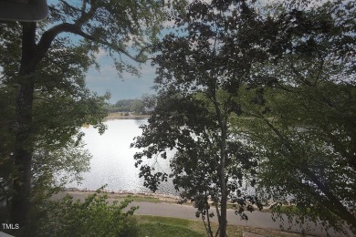 Waterfront property on Loch Lomond in Lochmere's Windsong on Lochmere Golf Club in North Carolina - for sale on GolfHomes.com, golf home, golf lot