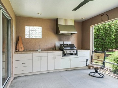 PRICE REDUCTION!  Turnkey Designer Home, walk to Sumter Square on Glenview Championship Golf and Country Club in Florida - for sale on GolfHomes.com, golf home, golf lot