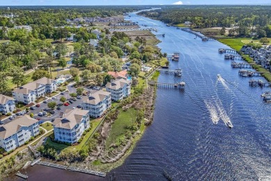 Welcome to your dream retreat! This exquisite top floor end unit on The Valley At Eastport in South Carolina - for sale on GolfHomes.com, golf home, golf lot