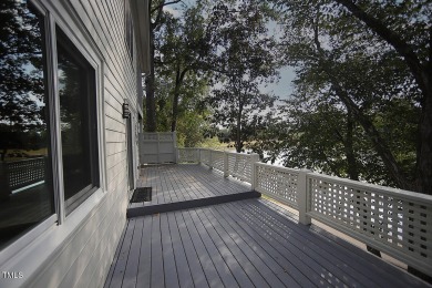 Waterfront property on Loch Lomond in Lochmere's Windsong on Lochmere Golf Club in North Carolina - for sale on GolfHomes.com, golf home, golf lot