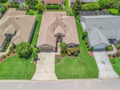 PRICE REDUCTION!  Turnkey Designer Home, walk to Sumter Square on Glenview Championship Golf and Country Club in Florida - for sale on GolfHomes.com, golf home, golf lot