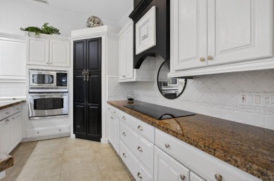 Live the Florida lifestyle in the sought-after community of on Deer Creek Golf Club in Florida - for sale on GolfHomes.com, golf home, golf lot