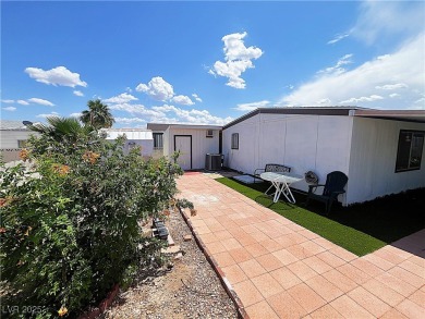 Welcome to your dreamy retreat in a vibrant 55+ community! This on Royal Links Golf Club in Nevada - for sale on GolfHomes.com, golf home, golf lot