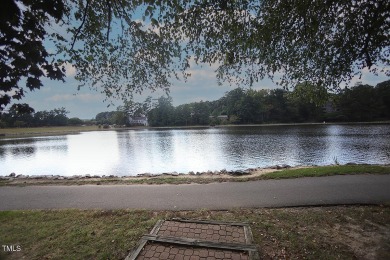 Waterfront property on Loch Lomond in Lochmere's Windsong on Lochmere Golf Club in North Carolina - for sale on GolfHomes.com, golf home, golf lot