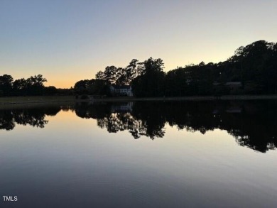 Waterfront property on Loch Lomond in Lochmere's Windsong on Lochmere Golf Club in North Carolina - for sale on GolfHomes.com, golf home, golf lot