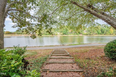 WATERFRONT property on Loch Lomond in Lochmere's Windsong on Lochmere Golf Club in North Carolina - for sale on GolfHomes.com, golf home, golf lot