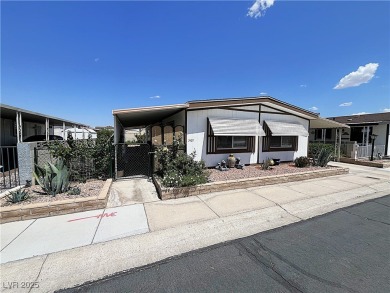Welcome to your dreamy retreat in a vibrant 55+ community! This on Royal Links Golf Club in Nevada - for sale on GolfHomes.com, golf home, golf lot