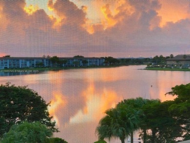 ENJOY STUNNING LAKE VIEWS from your balcony! This LARGEST CORNER on Flamingo Lakes Country Club in Florida - for sale on GolfHomes.com, golf home, golf lot
