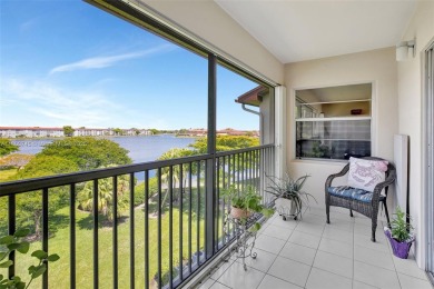ENJOY STUNNING LAKE VIEWS from your balcony! This LARGEST CORNER on Flamingo Lakes Country Club in Florida - for sale on GolfHomes.com, golf home, golf lot