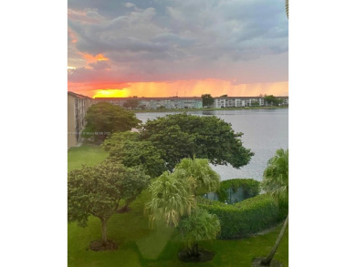ENJOY STUNNING LAKE VIEWS from your balcony! This LARGEST CORNER on Flamingo Lakes Country Club in Florida - for sale on GolfHomes.com, golf home, golf lot