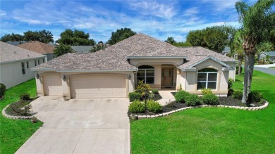 Welcome to this beautifully expanded Gardenia model in Sunset on The Links of Spruce Creek in Florida - for sale on GolfHomes.com, golf home, golf lot