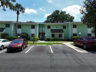 2nd floor condo located in the 55+ community of Live Oak Village on Country Club At Silver Springs Shores in Florida - for sale on GolfHomes.com, golf home, golf lot