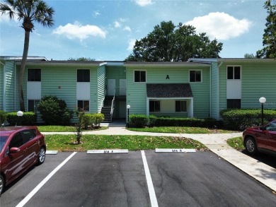 2nd floor condo located in the 55+ community of Live Oak Village on Country Club At Silver Springs Shores in Florida - for sale on GolfHomes.com, golf home, golf lot