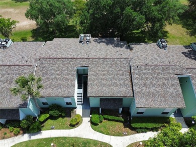 2nd floor condo located in the 55+ community of Live Oak Village on Country Club At Silver Springs Shores in Florida - for sale on GolfHomes.com, golf home, golf lot