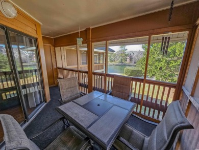 Beautiful lake view from this large screened-in porch that has on Arcadian Shores Golf Club in South Carolina - for sale on GolfHomes.com, golf home, golf lot