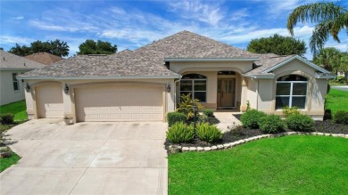 Welcome to this beautifully expanded Gardenia model in Sunset on The Links of Spruce Creek in Florida - for sale on GolfHomes.com, golf home, golf lot
