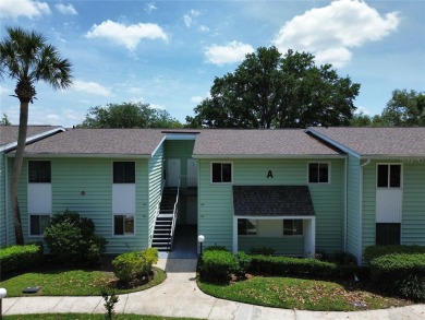 2nd floor condo located in the 55+ community of Live Oak Village on Country Club At Silver Springs Shores in Florida - for sale on GolfHomes.com, golf home, golf lot