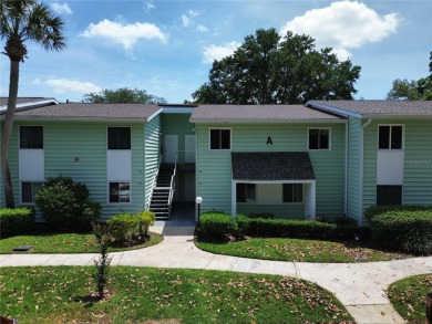 2nd floor condo located in the 55+ community of Live Oak Village on Country Club At Silver Springs Shores in Florida - for sale on GolfHomes.com, golf home, golf lot