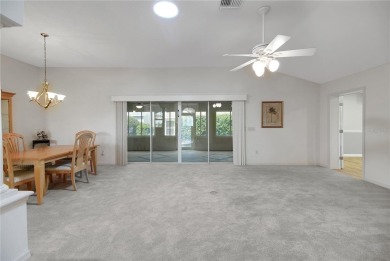 Welcome to this beautifully expanded Gardenia model in Sunset on The Links of Spruce Creek in Florida - for sale on GolfHomes.com, golf home, golf lot