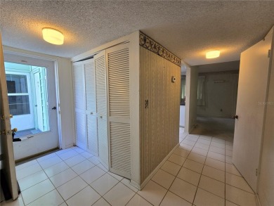 2nd floor condo located in the 55+ community of Live Oak Village on Country Club At Silver Springs Shores in Florida - for sale on GolfHomes.com, golf home, golf lot