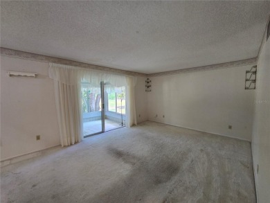 2nd floor condo located in the 55+ community of Live Oak Village on Country Club At Silver Springs Shores in Florida - for sale on GolfHomes.com, golf home, golf lot