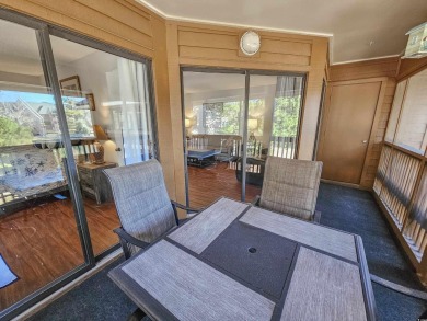 Beautiful lake view from this large screened-in porch that has on Arcadian Shores Golf Club in South Carolina - for sale on GolfHomes.com, golf home, golf lot