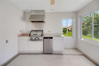 Welcome to this beautifully expanded Gardenia model in Sunset on The Links of Spruce Creek in Florida - for sale on GolfHomes.com, golf home, golf lot